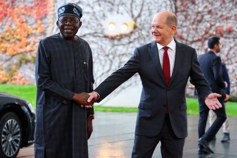 German-Chancellor-Olaf-Scholz-shakes-hands-with-Nigerian-President-Bola-Tinubu-during-the-Compact-with-Africa-investment-summit-at-the-Chancellery-in-Berlin-Germany