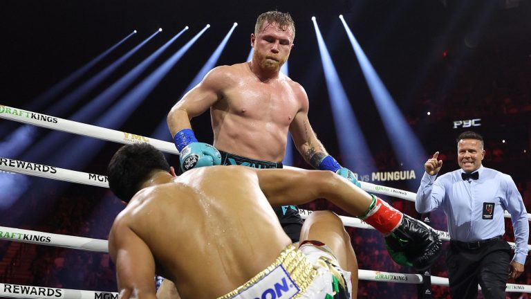 Canelo Alvarez beats Jaime Munguia on points to defend titles