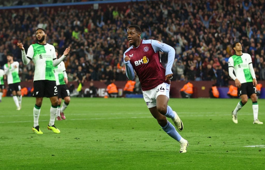 Aston Villa staged a dramatic late comeback against Liverpool at Villa Park to earn a vital point in the race for fourth place in the Premier League.