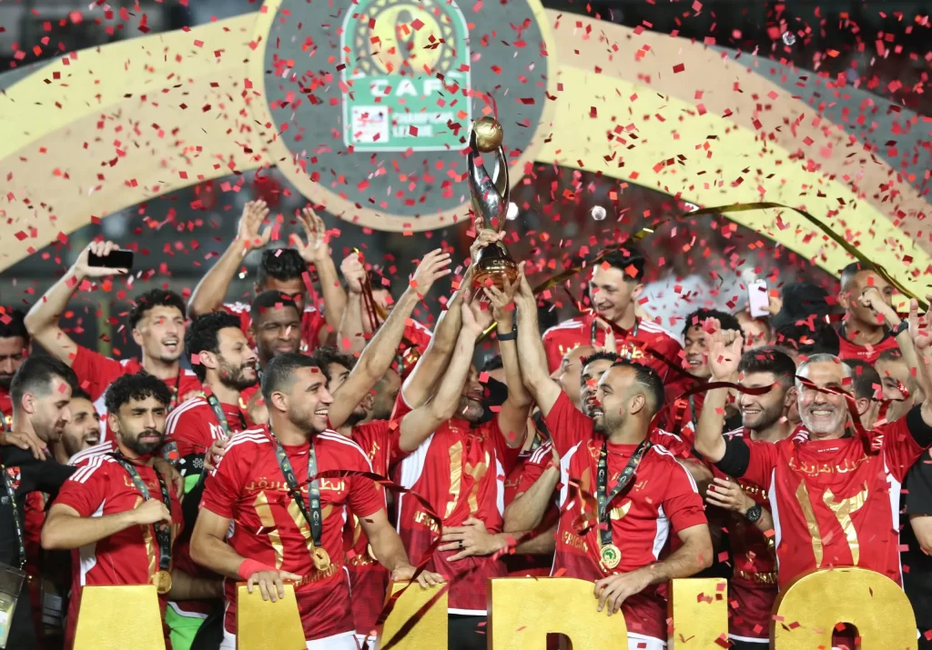 An early own goal from Roger Aholou secured a 1-0 victory for Al Ahly of Egypt against Tunisian side Esperance, earning them a record-extending 12th CAF Champions League title. 