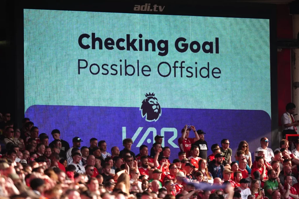 English Premier League clubs voted on Thursday to continue using the Video Assistant Referee (VAR) system for the upcoming season, despite ongoing controversies and criticisms.