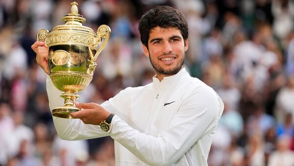 Carlos Alcaraz powered to victory over Novak Djokovic to retain his men's singles title at Wimbledon.