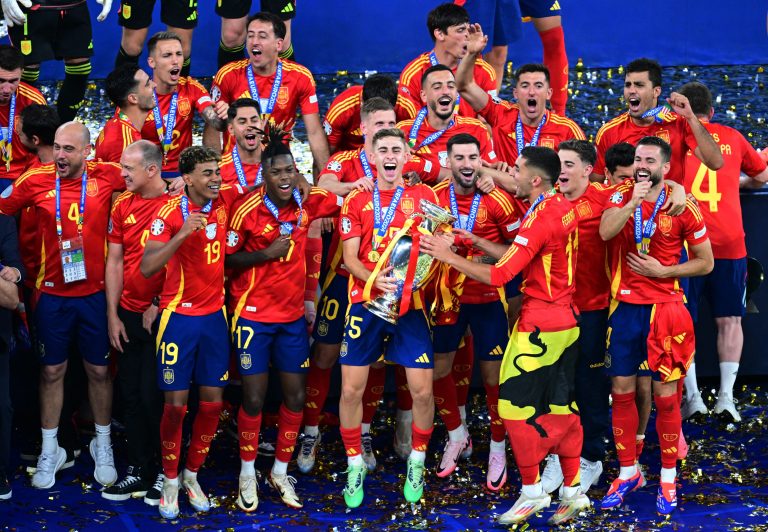 Spain completed a perfect competition by beating England 2-1 to lift a record fourth European Championship.