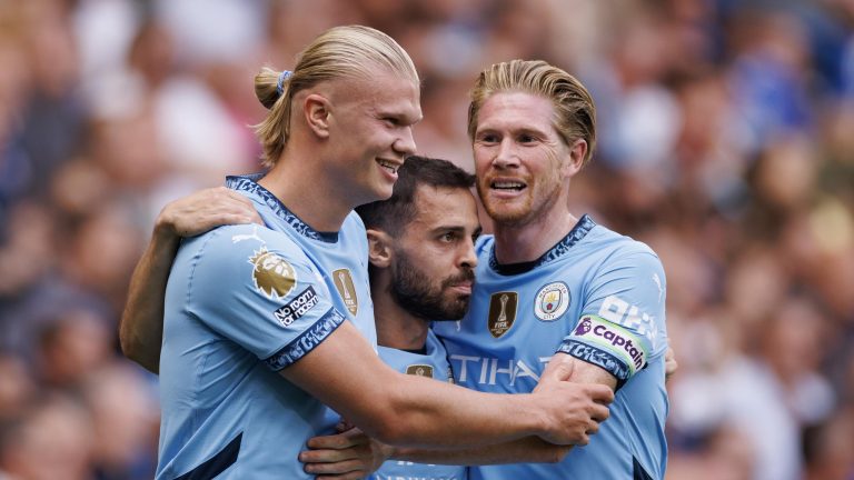 Manchester city players haaland, bernardo silva, de bruyne celebrating